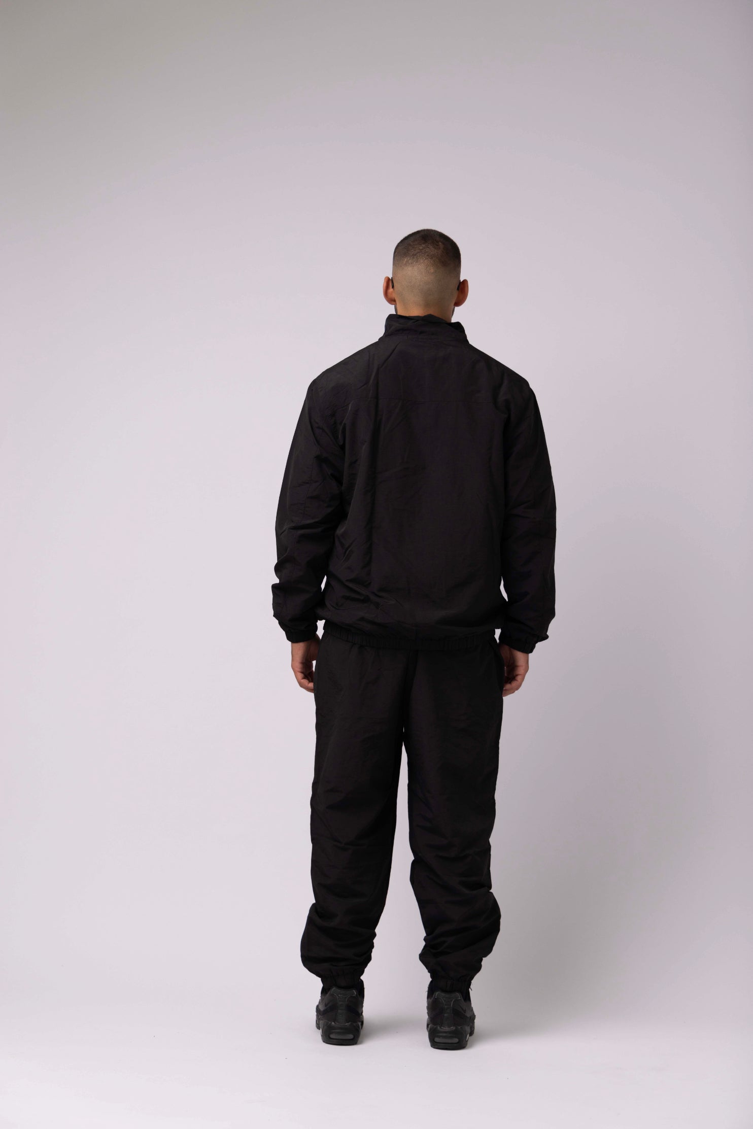 AC - Black Tracksuit